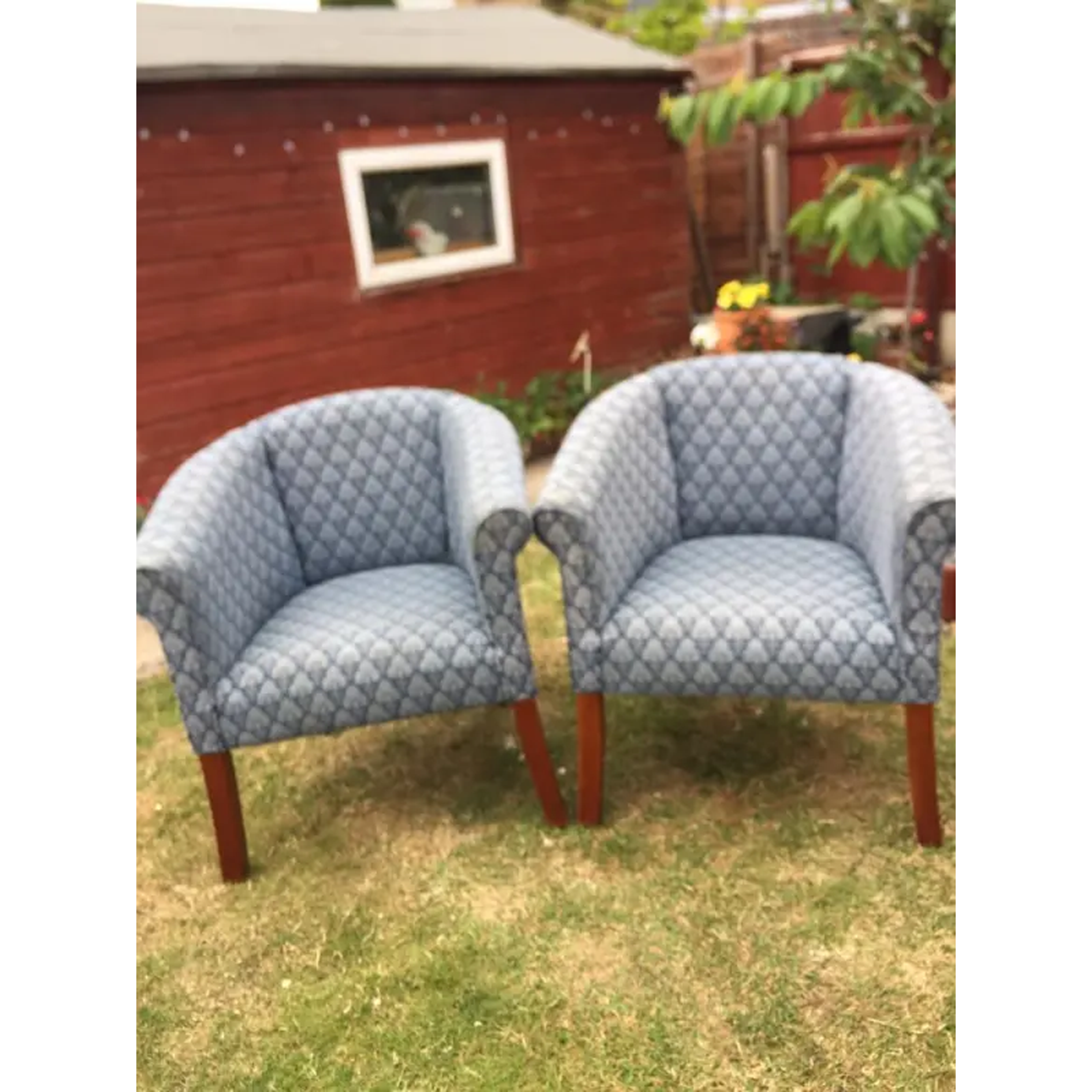 Two matching cup chairs. Delivery available.