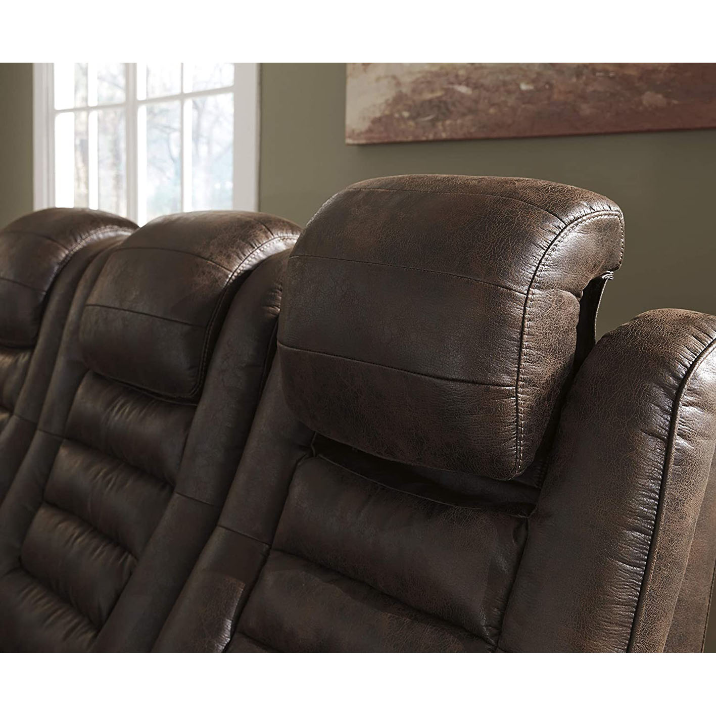 Signature Design by Ashley Game Zone Faux Leather Adjustable Power Reclining Sofa with Cup Holders and Storage